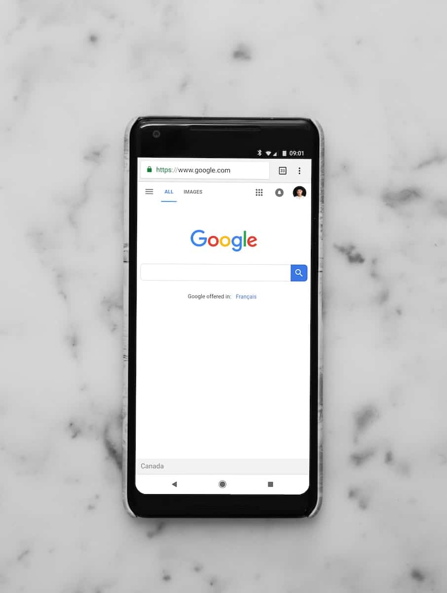 google on phone screen on table